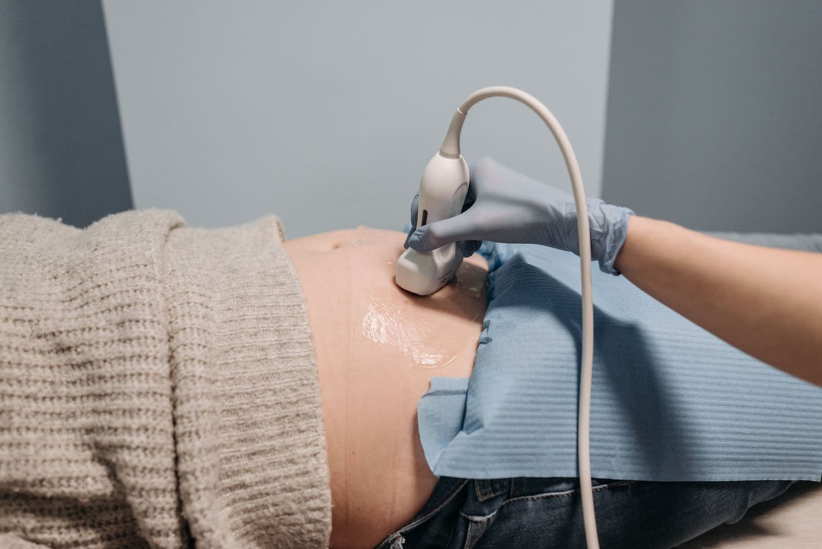 A close view of an abdominal ultrasound in progress